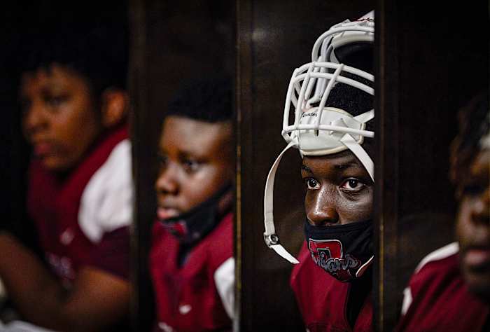 Ju-Marcus joined teammates and coaches in a risky moment of togetherness,